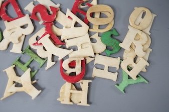 Boxed stained ivory letters, 19th century